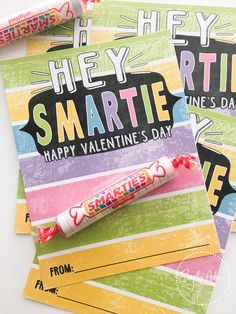 three valentine's day cards with candy on them, one is for smarties