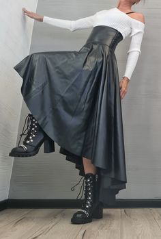 "New Collection Eco Leather Skirt, High Waist Black Skirt, Asymmetric Skirt, Extravagant Woman Skirt, Short Long Skirt, Wedding Skirt ❤️ Extravagant designs and high quality fabrics! You can wear it like a skirt, dress and tunic On the inside there are links to find and customize in your own way ❤️ Materials & Care  Eco Leather Hand wash at low temperatures. Do not machine dry. Do not iron. Do not dry clean! ❤️ Sizing We can make your piece from XS to 5XL! Everything in the shop can be also made Asymmetrical Pleated Skirt For Formal Occasions, Asymmetrical Pleated Formal Skirt, Gothic Bottoms With Asymmetrical Hem, Gothic Asymmetrical Hem Skirt, Asymmetrical Fitted Pleated Skirt, Asymmetrical Pleated Fitted Skirt, Formal Lined Skirt With Asymmetrical Hem, Asymmetrical Lined Skirt For Evening, Asymmetrical Lined Evening Skirt