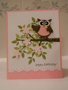 a card with an owl sitting on a branch