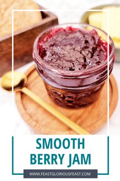 a close up of a jar of jam on a cutting board