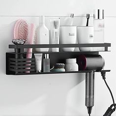 a hair dryer and other items on a shelf