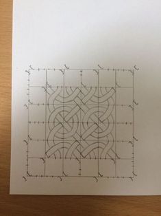 a piece of paper with an intricate design on it