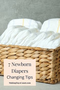 a basket filled with diapers sitting on top of a table