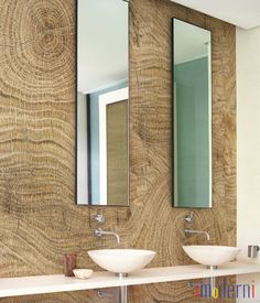 a bathroom with two sinks and mirrors on the wall next to it is instagram