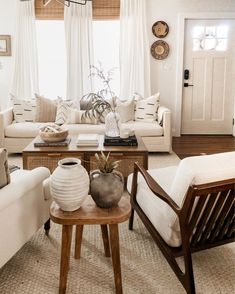 the living room is clean and ready for us to use it's natural light