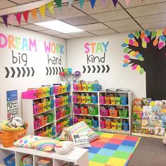 the children's playroom is decorated with colorful toys and books for their little ones