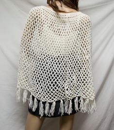 Poncho top,knit poncho,Soft, White, Fringed,poncho Pretty, white colored knitted poncho with fringe Measures: Bust: 50'' Length: 20'' Excellent condition- clean, no stains or damage A265 Poncho top,knit poncho,Soft, White, Fringed,poncho One Size Knit Poncho With Fringe, One Size Acrylic Poncho Shawl, Casual One Size Poncho With Fringe, Casual One-size Poncho With Fringe, White One Size Acrylic Sweater, Bohemian Knit Poncho With Fringe, Spring Fringe Poncho One Size, White Knit Poncho For Fall, Oversized Fringe Casual Poncho