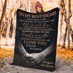 a woman holding a blanket with the words to my boyfriend and i love you forever