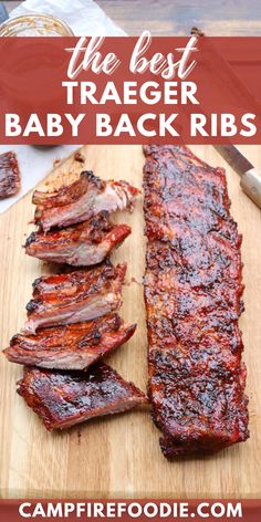 baby back ribs on a cutting board with text overlay that reads the best traeger baby back ribs