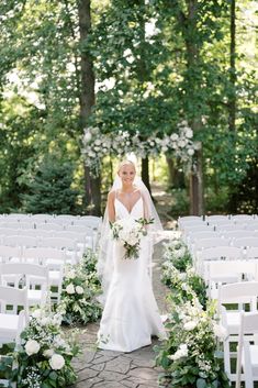 a bride walking down the aisle at her wedding