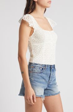 Turn on the romance in this top with a layer of pretty eyelet defining the fitted silhouette and forming the barely there cap sleeves. 17" length (size Medium) Button half placket Square neck Cap sleeves Partially lined 100% cotton Hand wash, dry flat Imported Sleeveless Eyelet Top For Spring, Fitted Classic Tops With Broderie Anglaise, Chic Sleeveless Eyelet Top, Chic Sleeveless Top With Eyelet Details, Fitted Feminine Eyelet Top, Fitted Short Sleeve Top With Broderie Anglaise, Elegant Summer Top With Cap Sleeves, Spring Tops With Broderie Anglaise, Fitted Broderie Anglaise Short Sleeve Top