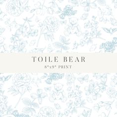 a blue and white floral wallpaper with the words toile bear on it