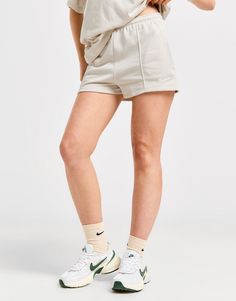 Bringing luxe energy to your laidback styles, cop these women's Essential Sportswear Chill French Terry Shorts from Nike. In a Light Orewood Brown colourway, these regular-fit shorts are made with a super-soft French terry cotton and polyester blend for lasting comfort. They have an elastic waistband with a drawstring to adjust the fit, and side pockets for quick and easy storage. Finished with pin tuck detailing and signature Swoosh branding. Machine washable. | Our model is 5'7" and wears a size small. Nike React Vision, 270 Nike, French Terry Shorts, Terry Shorts, Women Essentials, Grey Nikes, Jd Sports, Laid Back Style, Easy Storage