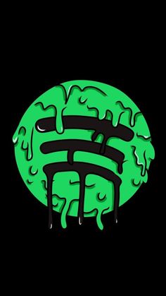 a green circle with black writing on it and water dripping from the top, in front of a dark background