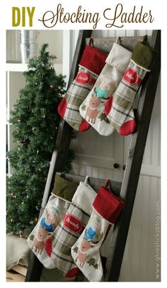 an old ladder is decorated with stockings for christmas