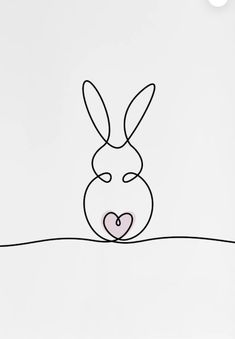 a drawing of a rabbit with a heart in its mouth