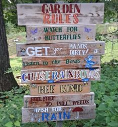 a wooden sign that has some words on it