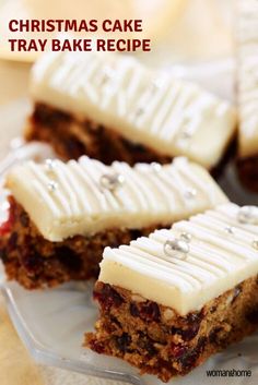 four pieces of cake sitting on top of a glass plate