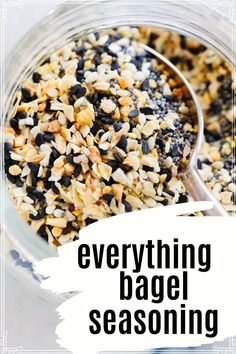 everything bagel seasoning in a glass jar with the words everything bagel seasoning on it