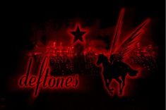 the words deftones are lit up with red lights and a silhouette of a man on a horse