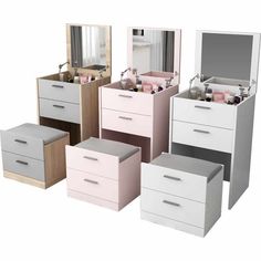 several different colored drawers with mirrors and lights on them in front of a white background