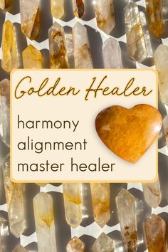 the golden heart is surrounded by many different rocks and crystals, including one that reads, golden healer harmony alignment master healer