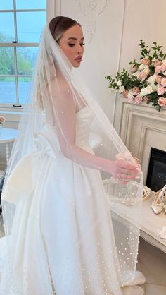 This Waltz length is simply sweet and perfect for the easy going bride and the pearls give the perfect amount of Sophistication needed for a Simple Yet Elegant Bridal Look! - The Waltz length (1.5M- 60 inch approx)  almost knee level for most people is ideal if you want a long veil that will not reach the floor. This veil is perfect for dancing ! ( depending on Bride Height & wearing a high heel) The Dainty Pearls are spread throughout the veil and are more packed on the edge of the veil adding Satin Wedding Dress With Pearl Veil, Pearly Long Veil, Floor Length Pearl Veil, Pearl Wedding Veil Cathedral, Cathedral Bridal Veils Pearl, Waltz Veil, Veil With Pearls, Ivory Veil, Layered Veil