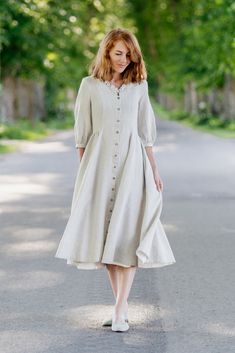 🌸Our versatile Linen Maxi Dress made from 100% linen with front buttons, was made to add a pinch of romance and reveal the natural feminine beauty of every woman. Its ¾ puff sleeves, V-neckline lined with ruffles as well as full circle skirt decorated with white interior lining at the bottom hem bring a vintage yet timeless touch to the look. This Cottagecore Dress comes with side seam pockets, making it truly convenient and perfect for all outdoor adventures! 🌸 DESIGN FEATURES: - Tailored fit Ophelia Dress, Dress Medieval, Cottagecore Dresses, Dress With Buttons, Full Circle Skirt, Cottagecore Dress, Medieval Dress, Full Circle Skirts, Button Front Dress