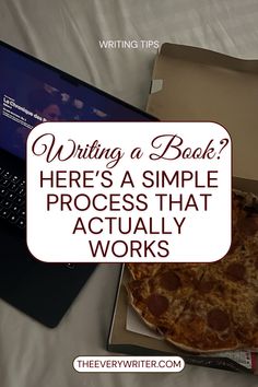 a pizza sitting in front of a laptop computer on top of a white sheet with the words writing a book here's a simple process that actually works