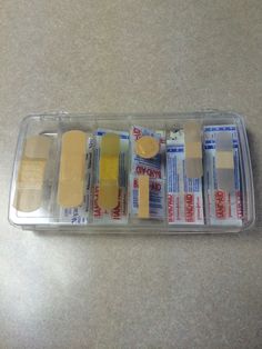 several different types of toothpaste in a plastic container