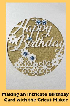 a birthday card with the words happy birthday and flowers in gold, white and blue