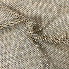 Gold Serene Iridescent Rhinestone Fishnet Lace Fabric - Fashion Fabrics LLC Rhinestone Fishnets, Textile Company, Fashion Fabric, Color Card, Lace Fabric, Dry Clean Only, Quality Fabric, Dry Clean, Textiles