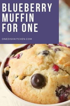 blueberry muffin in a white bowl with text overlay that reads, blueberry muffin for one