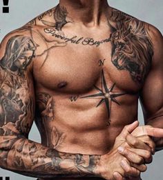 a shirtless man with tattoos on his chest and arm is posing for the camera