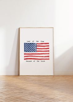 an american flag with the words land of the free on it