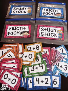 several bags filled with numbers and place mats for students to use in their math centers