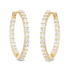 These CZ huggie hoops are the perfect addition to your stack. Create a look as unique as you! Made in responsibly sourced 18K plated yellow gold for everyday wear with proper care. Stone: Cubic Zirconia Hoop Diameter: 24 mm Hoop Width: 1.82 mm Gold Hoop Earrings With Prong Setting, Yellow Gold Huggie Diamond Earrings With Halo, Yellow Gold Diamond Huggie Earrings With Halo, Yellow Gold Plated Hoop Earrings With Vvs Clarity, Small Hoop Yellow Gold Cubic Zirconia Earrings, Gold Hoop Diamond Earrings With Vvs Clarity, Vvs Clarity Gold Hoop Diamond Earrings, Gold Vvs Clarity Diamond Hoop Earrings, Diamond Cut Gold Plated Huggie Earrings