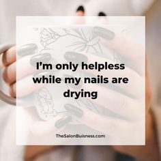 a woman holding a piece of paper with the words i'm only helpless while my nails are drying