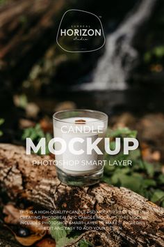 a candle is sitting on top of a tree branch with the words candle mockup