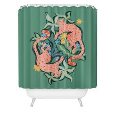 a shower curtain with an image of two cats in the middle of flowers and leaves