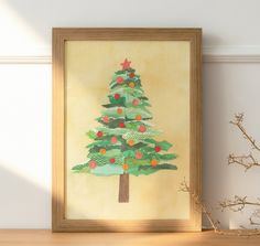 a painting of a christmas tree on a shelf