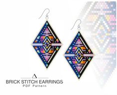 a pair of earrings that are made out of beaded fabric and have geometric designs on them