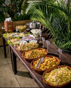 a buffet table filled with lots of food