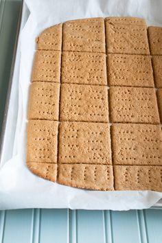 some crackers are sitting on a sheet of paper