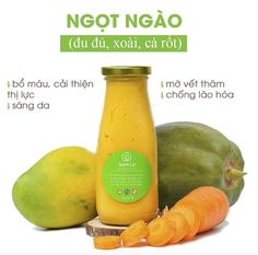 a bottle of orange juice next to some fruit and vegetables on a white background with the words ngot ngao du du, xoai, ca roh