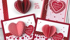 three valentine's day cards with hearts on them, one is folded and the other has