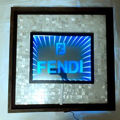 a television screen with the word fendi on it