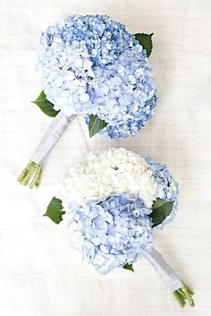 two bouquets of blue and white hydrangeas