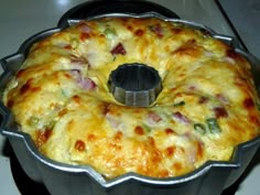 a cake that is sitting in a pan on the stove