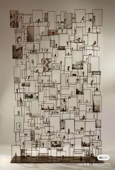 an abstract sculpture with many pictures on it